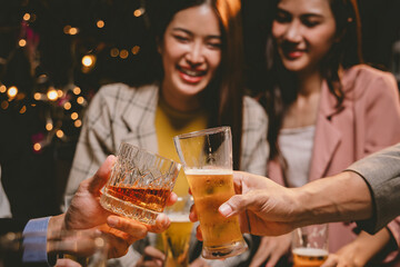 A cheerful group of friends enjoying wine and food on a sunny patio. Toasting with wineglasses, they celebrate togetherness in a scenic outdoor setting, blending fun, friendship, and a festive mood.