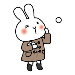冬服を着て雪合戦をする白いうさぎ