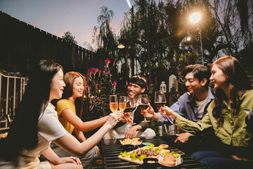 A lively group of friends enjoying beers at a festive pub, toasting with frosty pints. The scene captures the joy of friendship, culture, and celebration over drinks and appetizers on a sunny terrace.