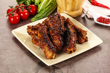 Grilled pork ribs in barbecue sauce