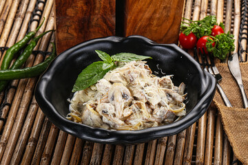 Italian pasta with chicken and mushrooms