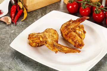 Tasty roasted chicken wing with spices