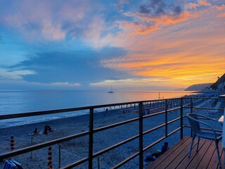 Fototapeta premium Sunset at Deiva Marina, Italy, at the pier