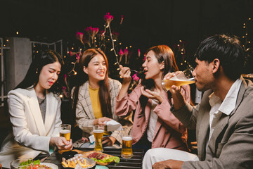 A lively group of friends enjoying beers at a festive pub, toasting with frosty pints. The scene captures the joy of friendship, culture, and celebration over drinks and appetizers on a sunny terrace.