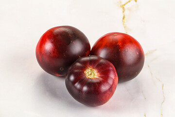 Black ripe juicy organic tomato