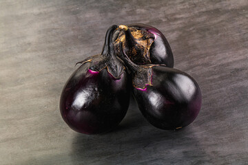 Raw violet and black eggplant