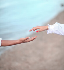 a couple of lovers taking pre-wedding photos on the beach