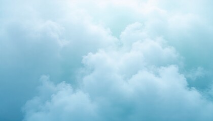 Obraz premium Fluffy clouds in the sky, serene atmosphere, blue tones, soft light, copy space