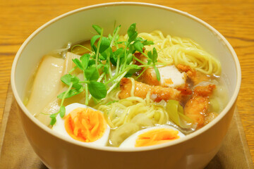 Warm and tasty ramen noodles, with egg, bamboo shoots and chicken cutlet.