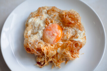 A plate of delicious fried egg makes a perfect and healthy lunch or dinner