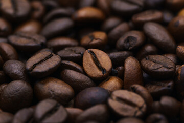 beautiful picture, background with coffee beans, close-up of spilled coffee, a mixture of robusta and Arabica