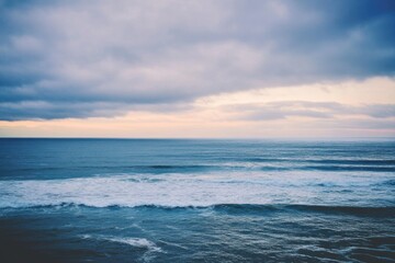 Obraz premium Person on a surfboard in the ocean, having fun