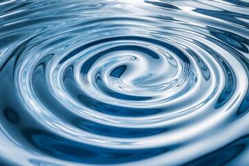 A close-up view of concentric blue circular ripples on a water surface, symbolizing tranquility, reflection, and the gentle continuity of nature's rhythms.