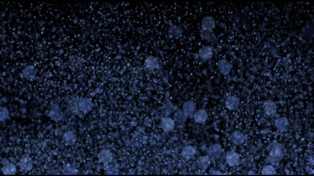 snowflakes and drops falling on the window