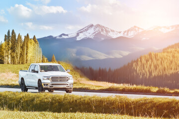 Front view of Modern white pickup truck in countryside