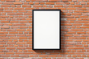 Blank black-framed poster on a red brick wall background.