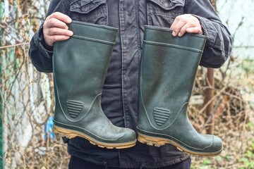 pair of rubber comfortable long green with sole protective garden waterproof modern new boots in...