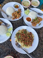 Rice topped with stir-fried pork and basil, Rice topped with stir fried minced pork and basil with Fried egg