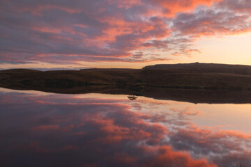 Quiraing mountains Reflections  at a lake in Skye Island, Scotland