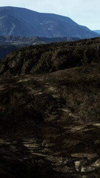 black volcanic basalt rock formations in the low light