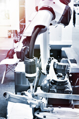 Welding robotic arm and metal part