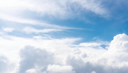 Naklejka premium Blue Sky Background with Fluffy White Clouds and Bright Sunlight