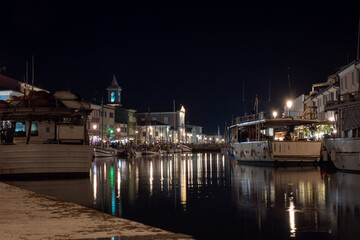 canal in the center of Cesenatico Rimini illuminated by lights at night