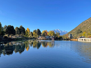 Black dragon pool in Lijiang Ancient Town with best views of Jade Dragon Snow Mountain. Famous travelling destination in Yunnan province, China