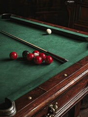 Classic Billiards Table with Red and White Balls and Cue in Luxurious Game Room