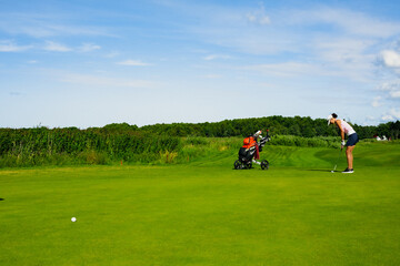 person riding a golf cart