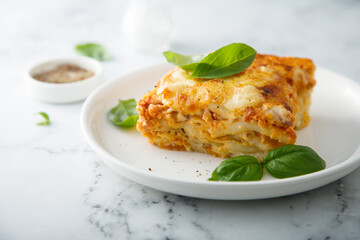 Homemade meatless lasagna with basil