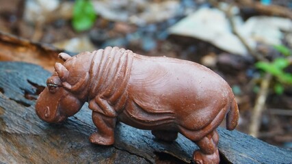 hippo toy, cute hippo toy in the photo on wood