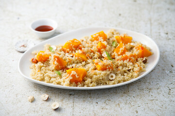 Roasted pumpkin with quinoa and hazelnut