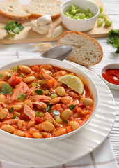 Pasulj, white bean soup with chicken in bowl
