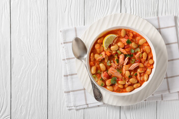 Pasulj, white bean soup with chicken in bowl