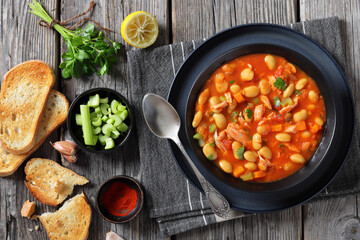Pasulj, white bean soup with chicken in bowl
