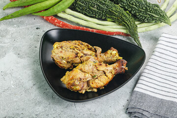 Chicken leg tikka with spices
