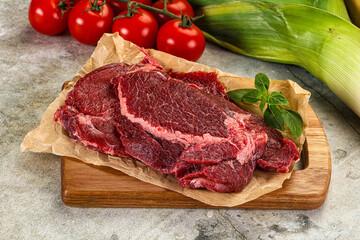 Raw beef cheeks cut for cooking