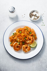 Shrimp biryani with lime and sweet pea
