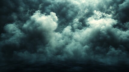 Obraz premium A dark and dramatic sky filled with thick, swirling clouds, creating a sense of mystery and foreboding.