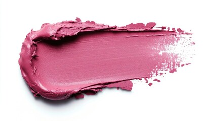 A pink lip gloss is smeared on a white background