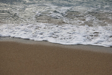 Beach with waves at Falasarna Beach on the island of Crete, Greece