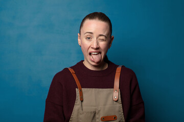 with cheerful, carefree, rebellious attitude, joking and sticking tongue out, having fun