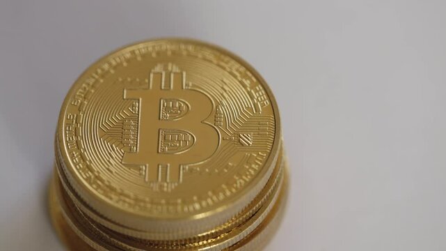 In a world of code, where freedom joins, the story of bitcoin coins. Close up static shot