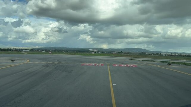 An exclusive piot&rsquo;s perspective FPV POV from inside a jet cokpit taxiing along the airport taxiway ready for takeoff. Clouded sky Palma de Mallorca airport. 4K