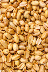 Pile of roasted salted peanut, group of nuts. Top view