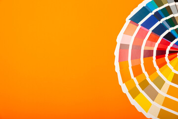 Color palette on a bright colored background. Color palette guide. paper catalog of rainbow color. creative.Palette, samples of trending colors. Color swatches. Decor and interior designer. Top view. 