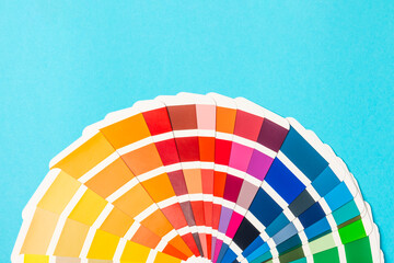 Color palette on a bright colored background. Color palette guide. paper catalog of rainbow color....