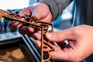 Laser engraving and cutting, using reclaimed wood, upcycling concept