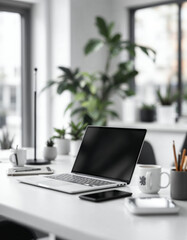 Laptop Computer, notebook, and eyeglasses sitting on a desk in a large open plan office space after working hours